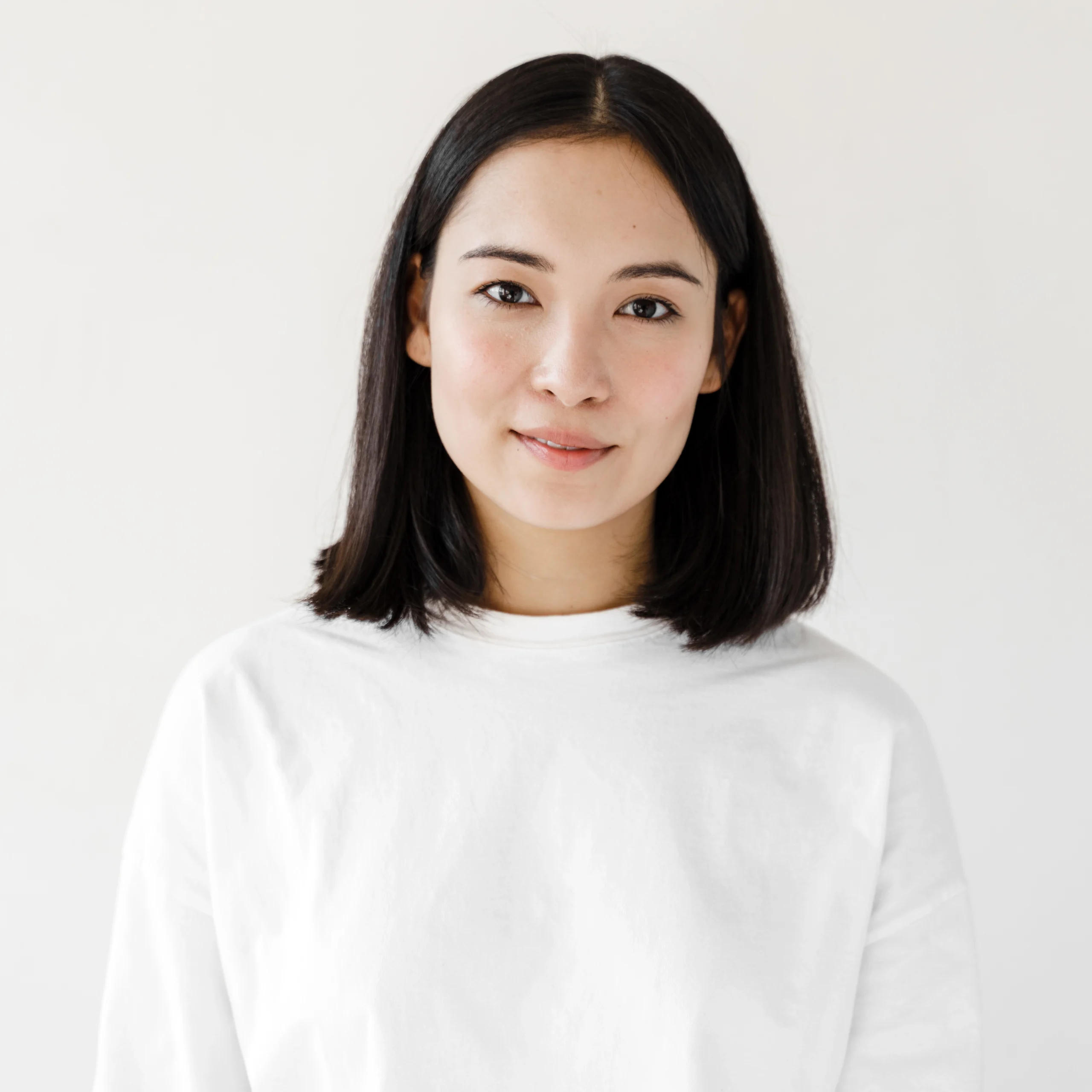 young brunette woman isolated white background
